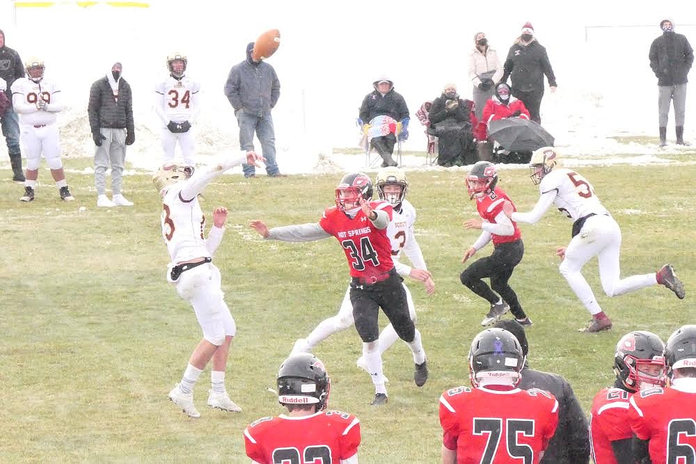 Hot Springs pass rusher Mario Garcia, a foreign exchange student from Spain, puts the  pressure on Bridger quarterback Chance Goltz. (Chuck Bandel/Valley Press)