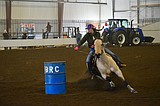 Horse and rider racing the clock