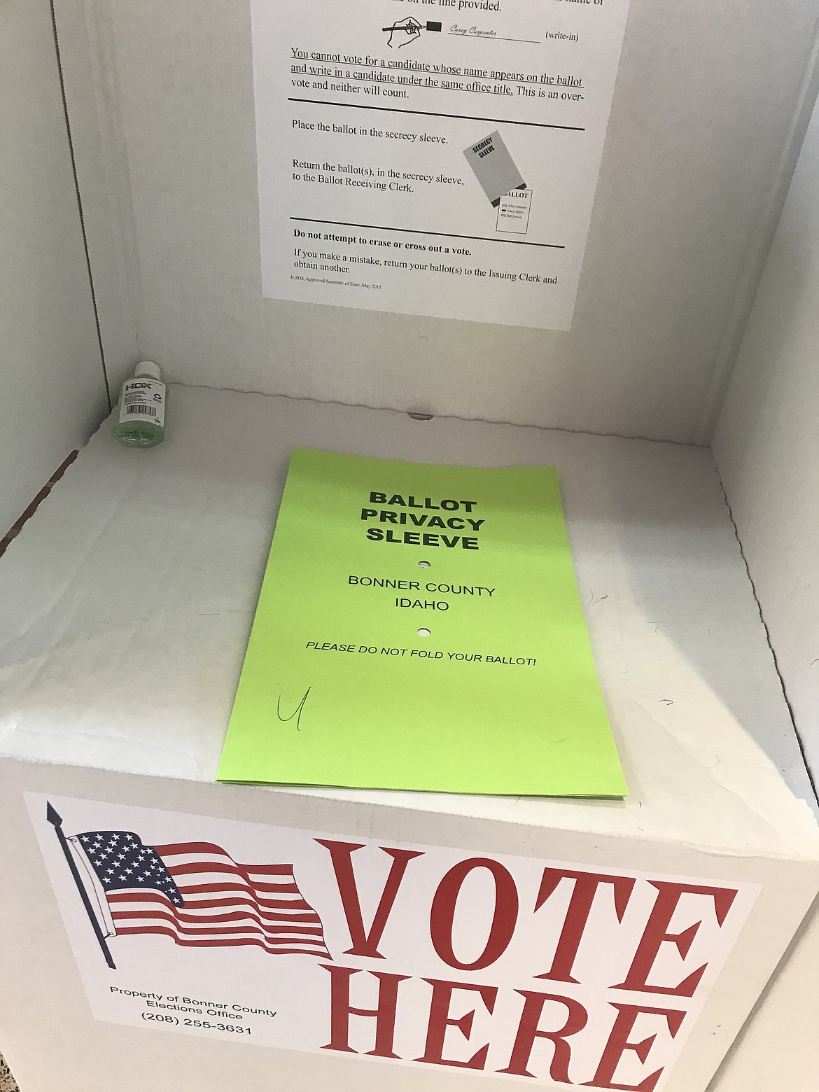 A ballot inside a privacy sleeve awaits casting on Monday.