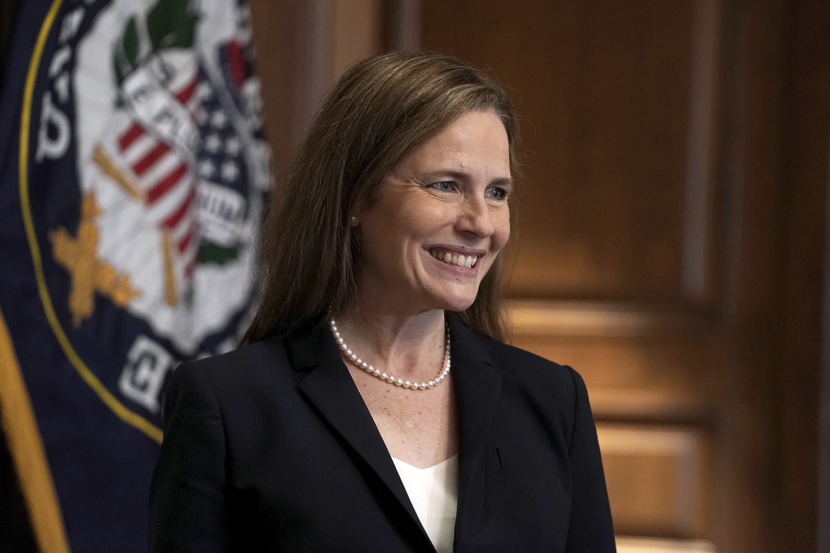 Supreme Court nominee Amy Coney Barrett, meets with Sen. Martha McSally, R-Ariz., Wednesday, Oct. 21, 2020, on Capitol Hill in Washington. (Greg Nash/Pool via AP)