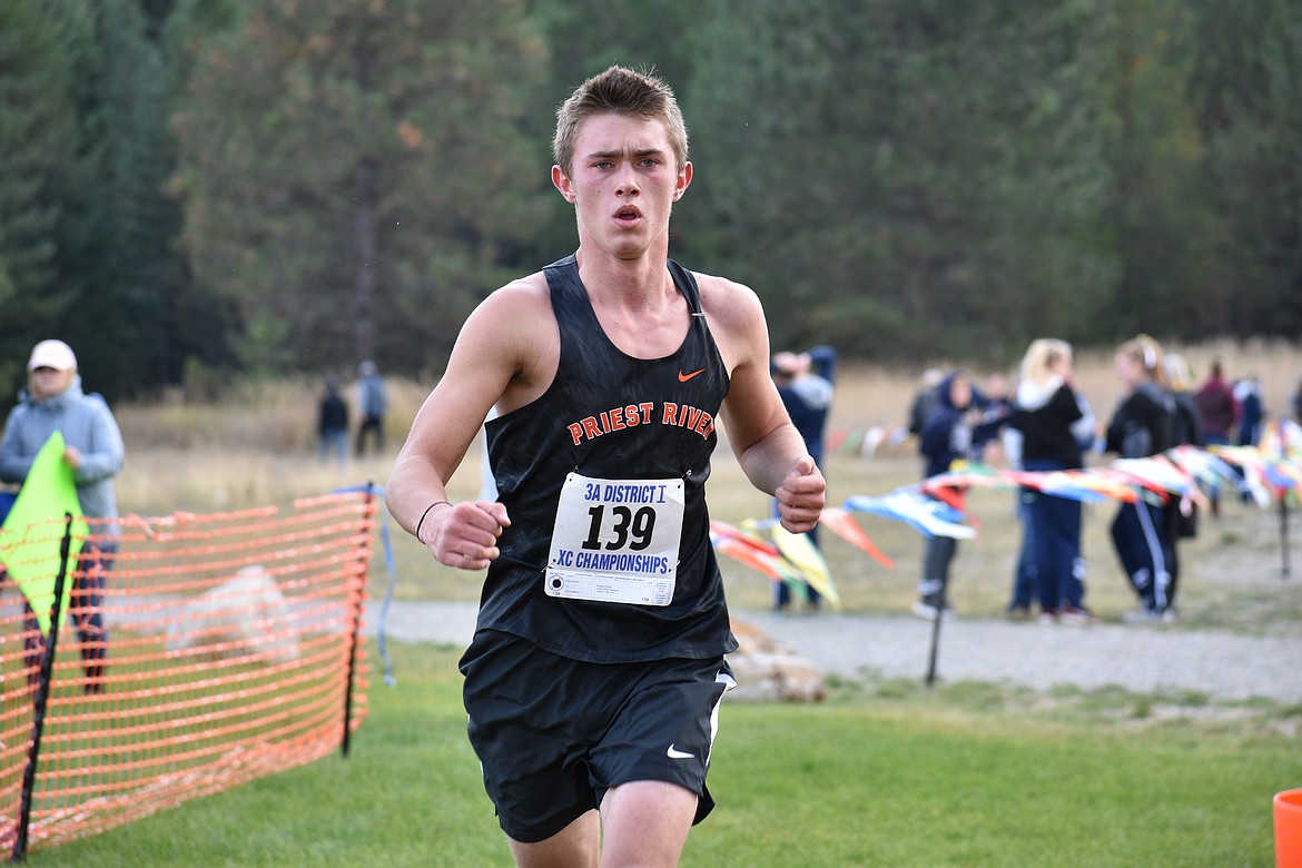 Freshman Keegan Poirier nears the finish of last Thursday's regional championship.