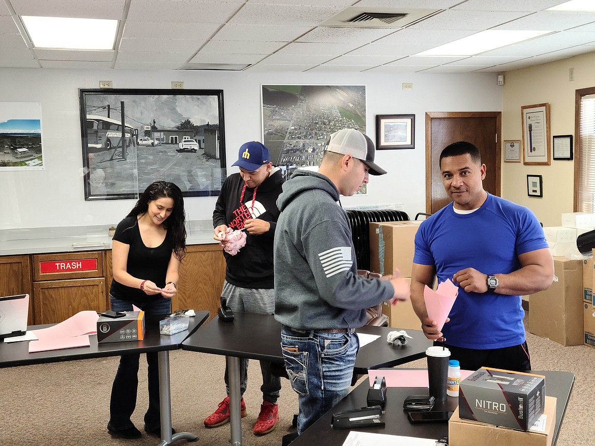 Mattawa Police Department personnel work on a team-building exercise during September's "officers call" meeting. The training meetings are held every month, said MPD Chief Joe Harris.