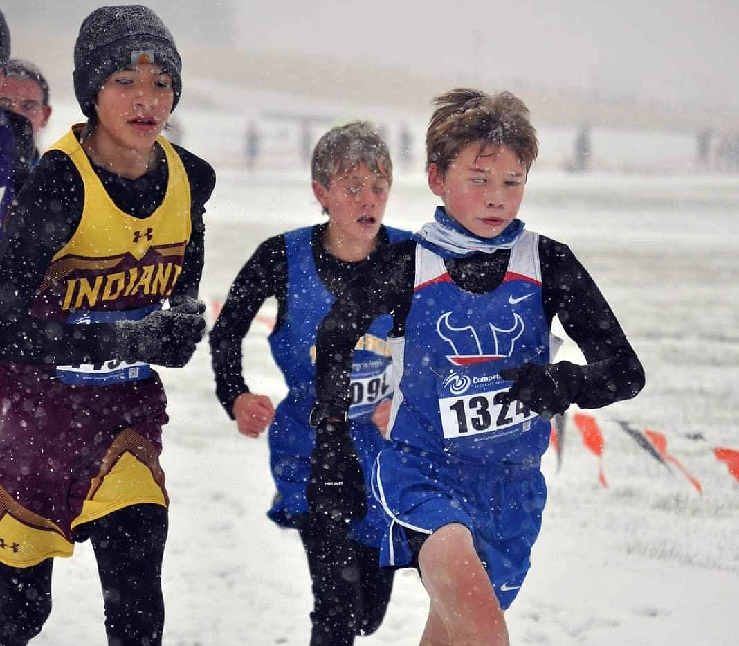 Vikings runner Colton Ballard takes on the elements at the state cross country meet in Kalispell Friday. (photo provided by Sarah Naegle)
