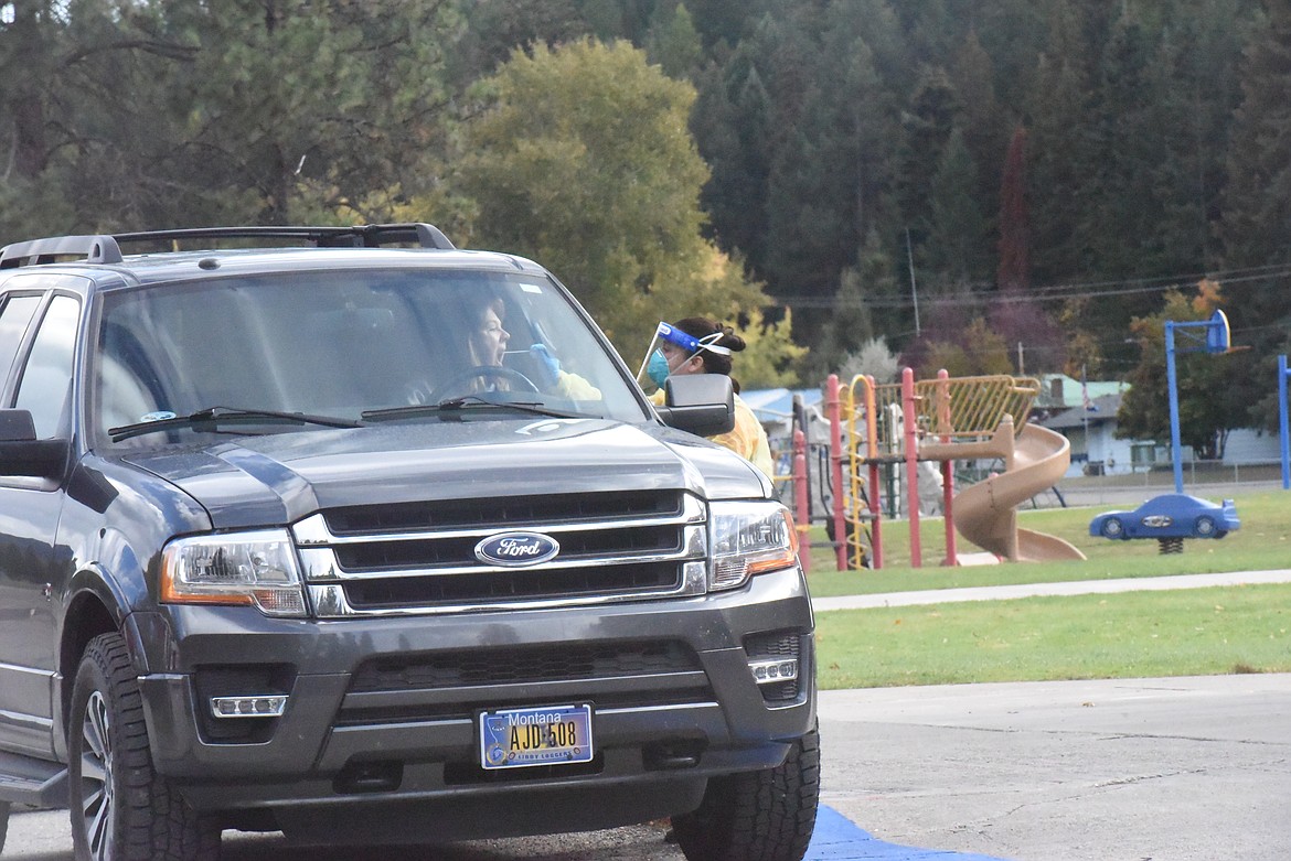 Health officials test teachers for the coronavirus at the Libby Elementary School on Oct. 14.