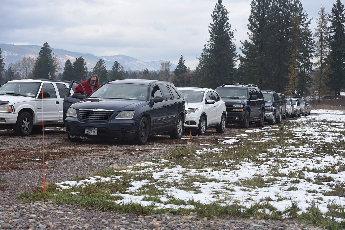 Drivers wait at the Libby Assembly of God parking lot to pick meals at an Oct. 28 Lincoln County Food Box Distribution event.