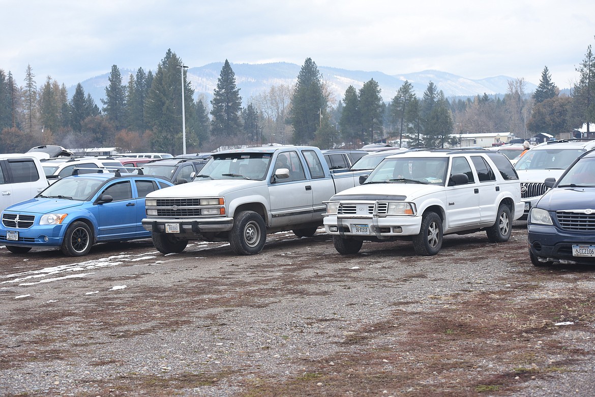 Drivers wait in line at the Libby Assembly of God parking lot to pick meals at an Oct. 28 Lincoln County Food Box Distribution event.