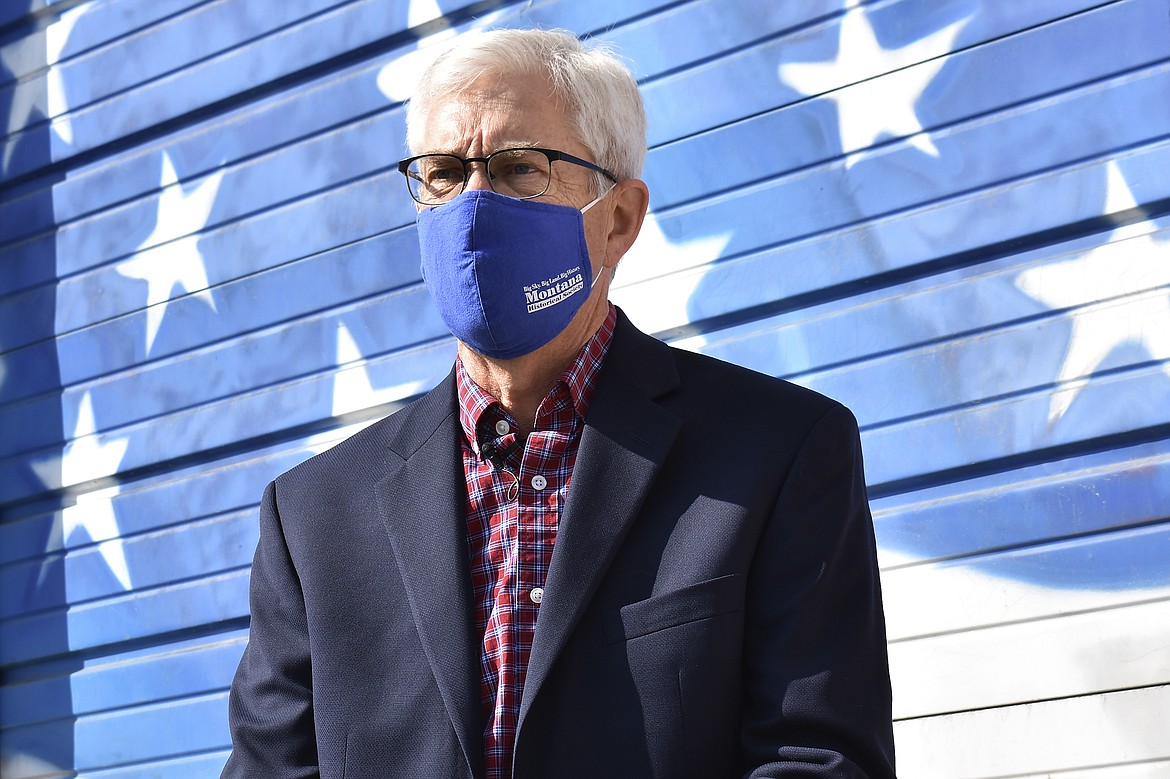 Montana Lt. Gov. and gubernatorial candidate Mike Cooney speaks to a reporter following a public safety roundtable event hosted by the Democrat's campaign, Oct. 9, 2020, in Billings, Mont. Cooney, a Democrat, and his Republican opponent, U.S. Rep. Greg Gianforte, both pledge to rely on the advice of public health professionals, but their approach to the virus has differed at every turn of the campaign. (AP Photo/Matthew Brown)