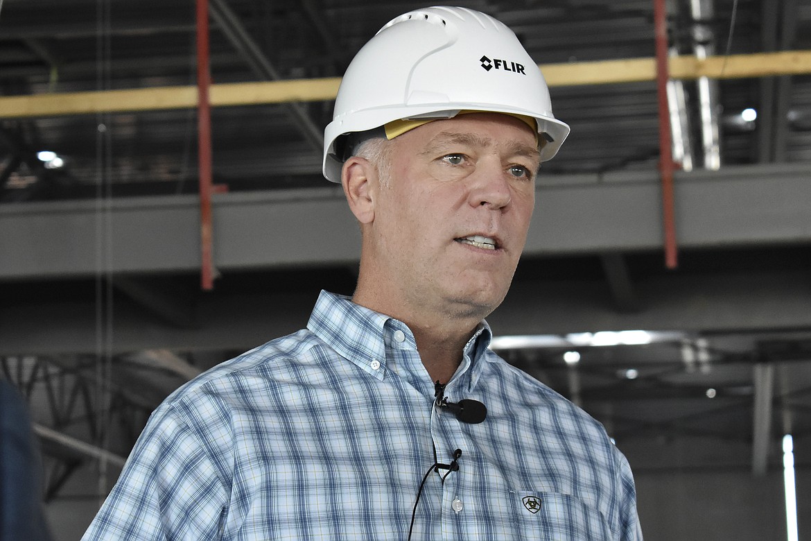 Montana U.S. Rep. and gubernatorial candidate Greg Gianforte speaks after touring a high tech manufacturing facility in Bozeman, Mont., Sept. 2, 2020. Gianforte, a Republican, and his Democratic opponent, Lt. Gov. Mike Cooney, both pledge to rely on the advice of public health professionals, but their approach to the virus has differed at every turn of the campaign. (AP Photo/Matthew Brown)