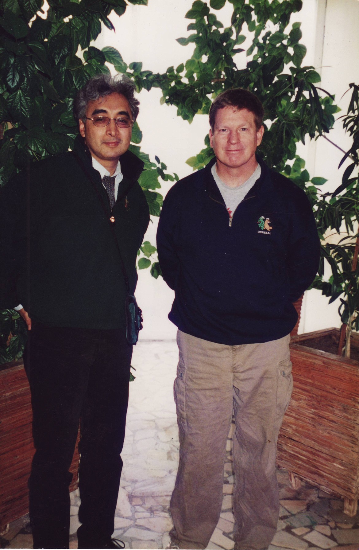 Dr. Jose Flores stands with Williams McMichael "Bill" Shepherd, a NASA astronaut who served as commander of Expedition 1, the first crew on the International Space Station. The photo was taken shortly before Shepherd launched from the Baikonur Cosmodrome on the Soyuz TM 31 to the space station.