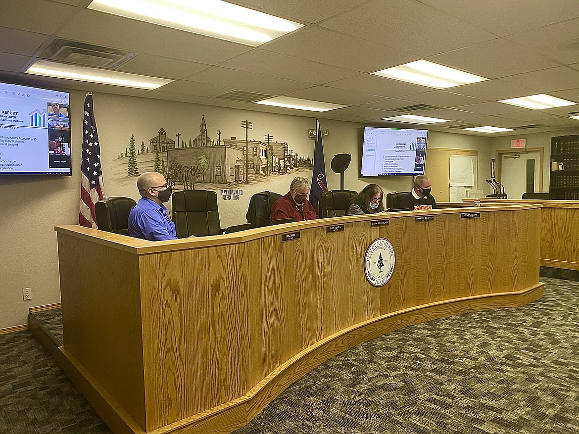 City council listened to the comments of concerned residents about a recent revision to city code regarding recreational vehicle and boat parking. From left: council member Mike Hill, Mayor Vic Holmes, council member Darrell Rickard, council members Steven Adams. (MADISON HARDY/Press)