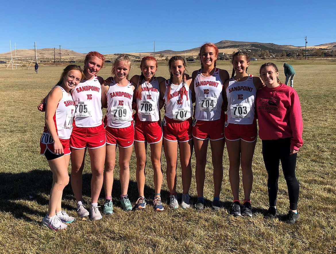 The SHS girls' cross country team poses for a photo at the 4A state championships on Friday. Pictured (from left): Camille Neuder, Annaby Kanning, Mackenzie Suhy-Gregoire, Grace Rookey, Megan Oulman, Ara Clark, Payton Betz and Quinn Hooper.