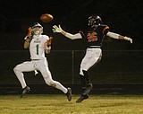 STATE 5A FOOTBALL PLAYOFFS: Late Trojan miscues costly