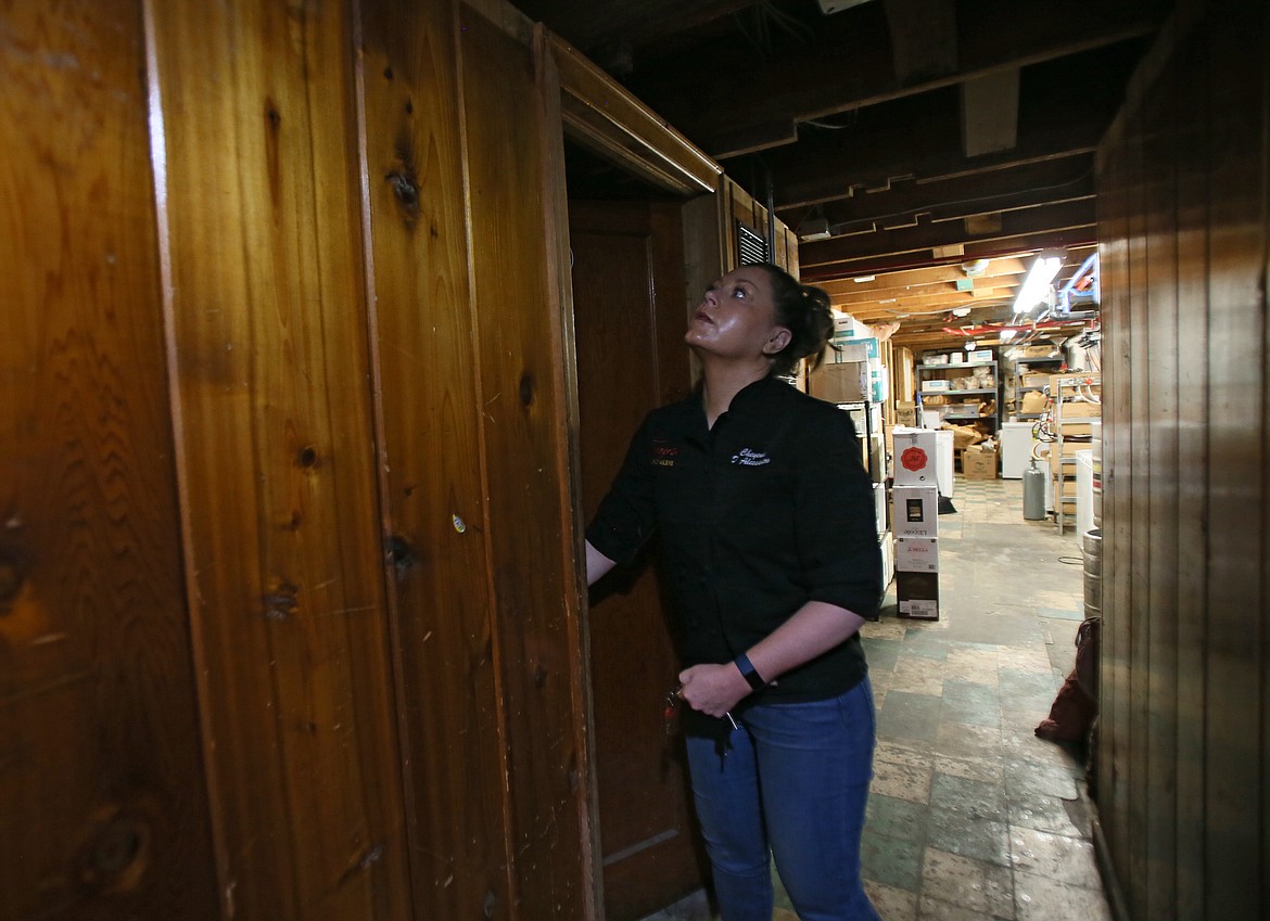 Cheyenne D'Alessandro, who owns Tony's on the Lake with parents Paul and Bonnie, unlocks a storage room that was once used as a crib for ladies of the night when the restaurant was a bordello in the '30s and 40s.