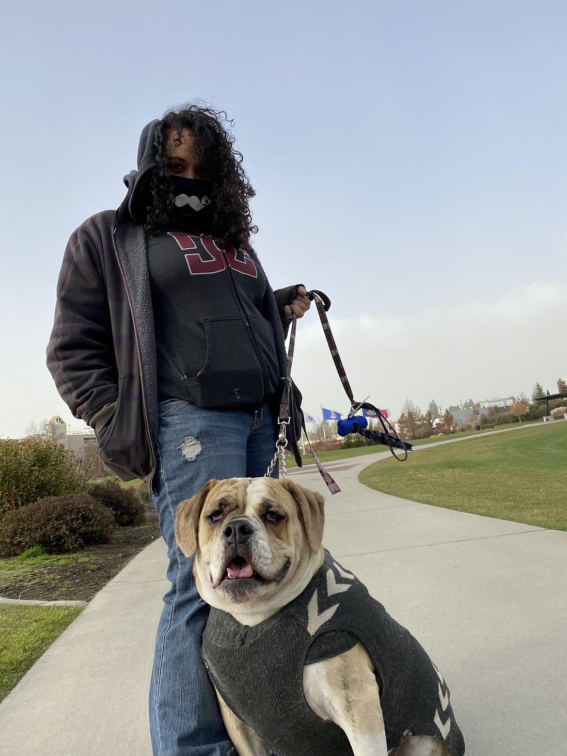 Danyelle Yerian, 41, and Zion take a stroll around the park on Halloween eve, after Coeur d'Alene sees a break in the rain. (MADISON HARDY/Press)