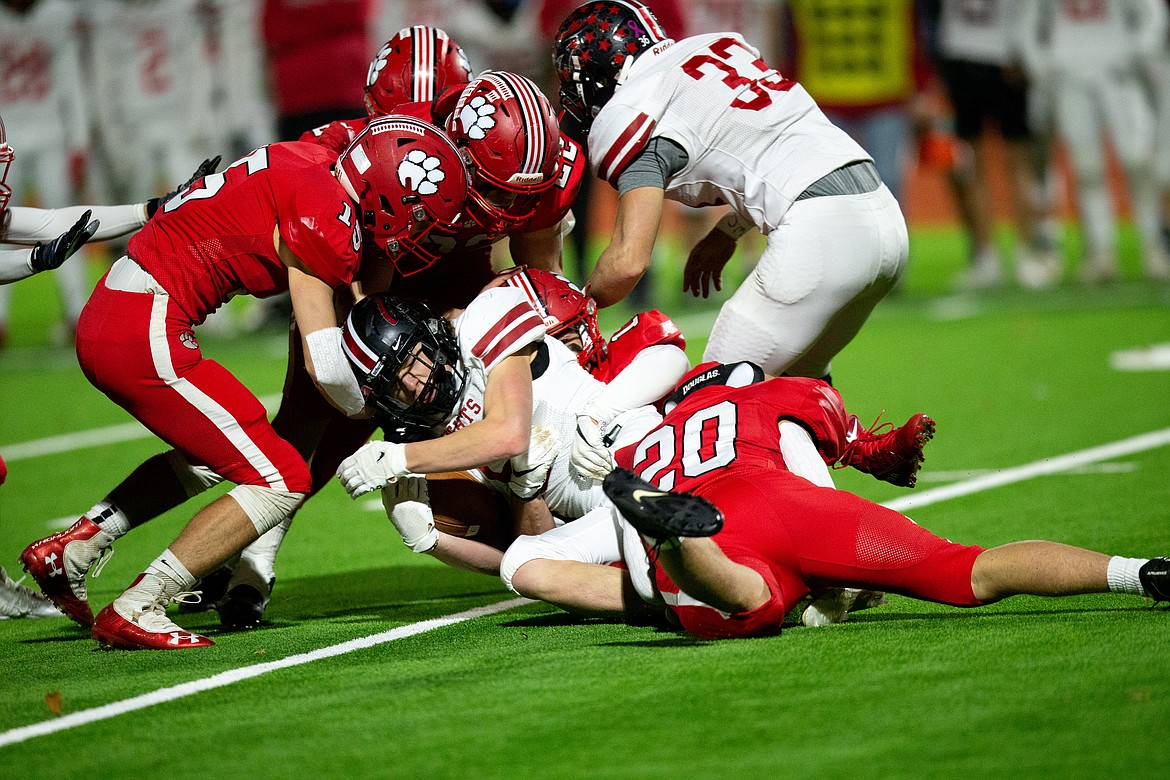 The Sandpoint defense rises up in the fourth quarter of Friday's game.