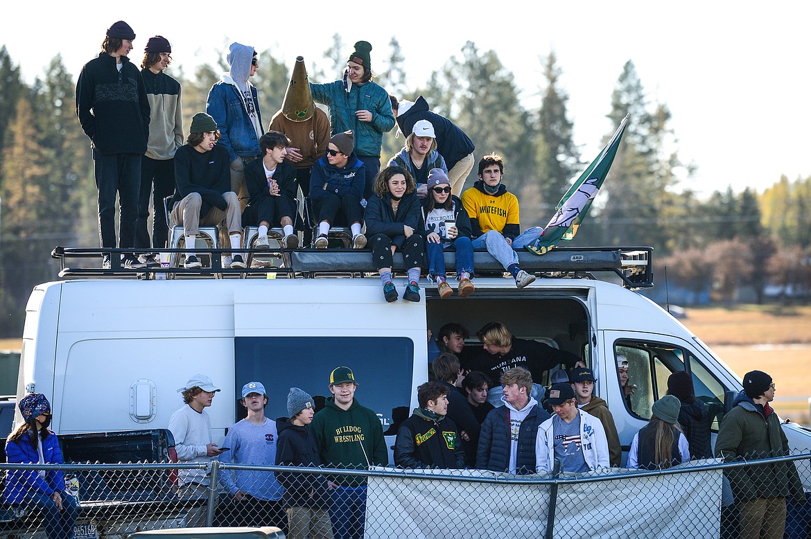 Whitefish fans watch from a van as the Bulldogs faced Columbia Falls in the Class A boys soccer championship at Smith Fields in Whitefish on Saturday. (Casey Kreider/Daily Inter Lake)
