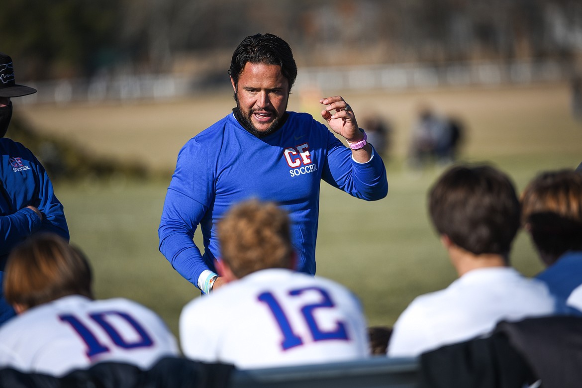 Columbia Falls head coach O'Brien Byrd speaks to the Wildcats at half as they face Whitefish during the Class A boys soccer championship at Smith Fields in Whitefish on Saturday. (Casey Kreider/Daily Inter