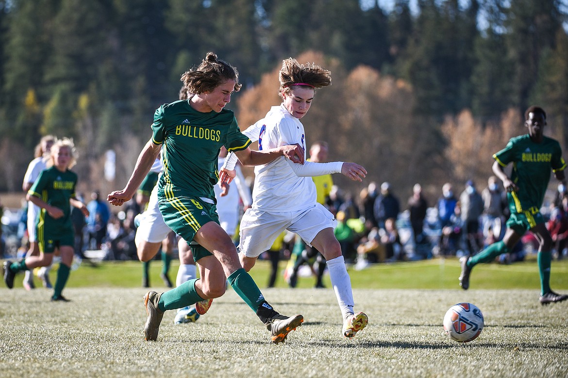 Whitefish's Gabe Menicke (9) scores his second goal of the game against Columbia Falls during the Class A boys soccer championship at Smith Fields in Whitefish on Saturday. (Casey Kreider/Daily Inter Lake)