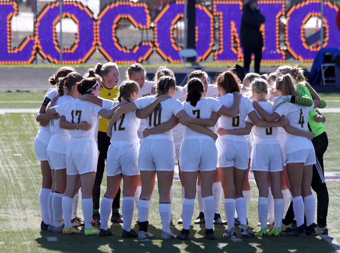 The Whitefish girls soccer team huddles up before the start of the game in Laurel. (Photo courtesy Amy Olson)