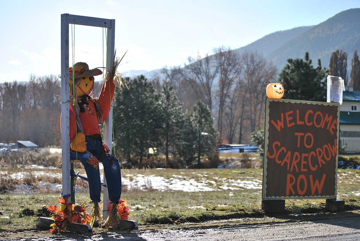 First place in the St. Regis Scarecrow Row went to a lovely scarecrow perched on a swing created by Penny Sundberg. (Amy Quinlivan/Mineral Independent)