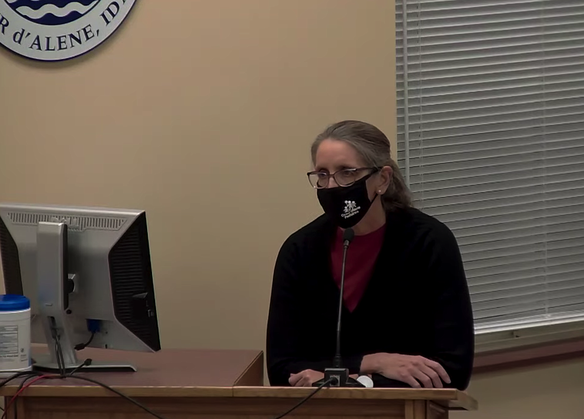 Beth Martin, a longtime pediatrician with Coeur d'Alene Pediatrics, discusses the balance of risk versus benefit of shortening quarantine time for students in the Coeur d'Alene School District during a school board meeting Monday.