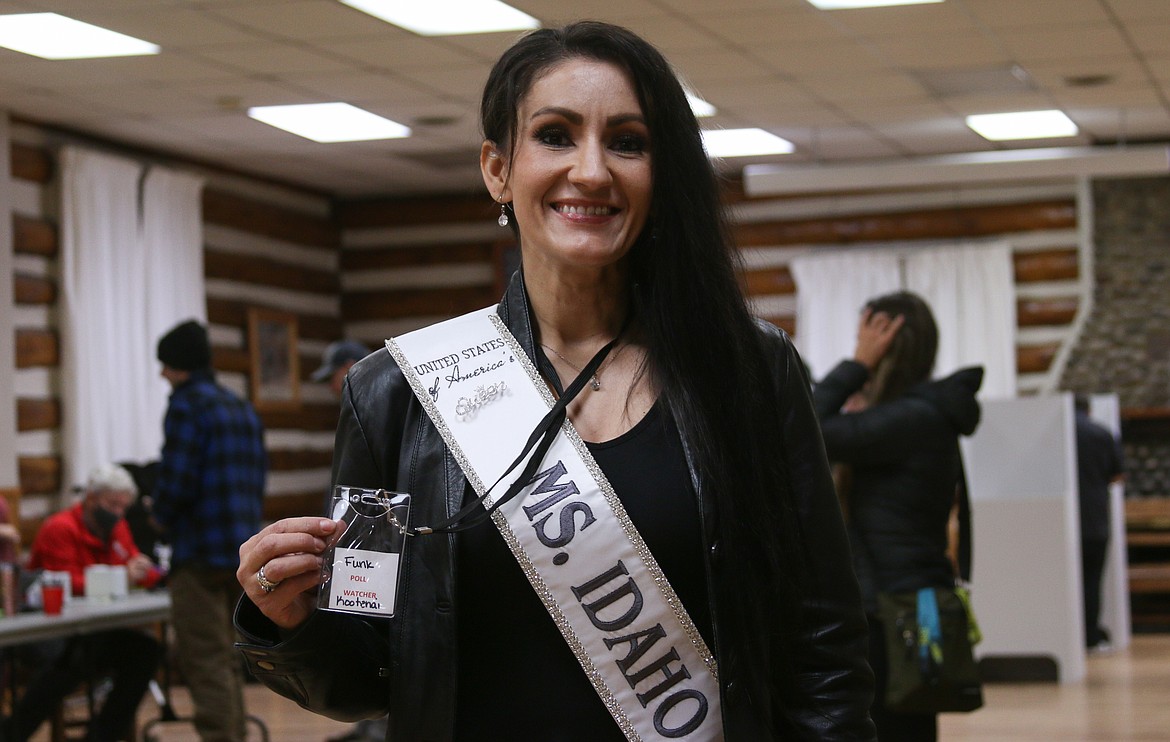 Katherine Funk-Adlard, the USOA “Ms Idaho” poses for a photo Tuesday night at Sandpoint Community Hall. Funk-Adlard served as an official poll watcher Tuesday night, she said.
