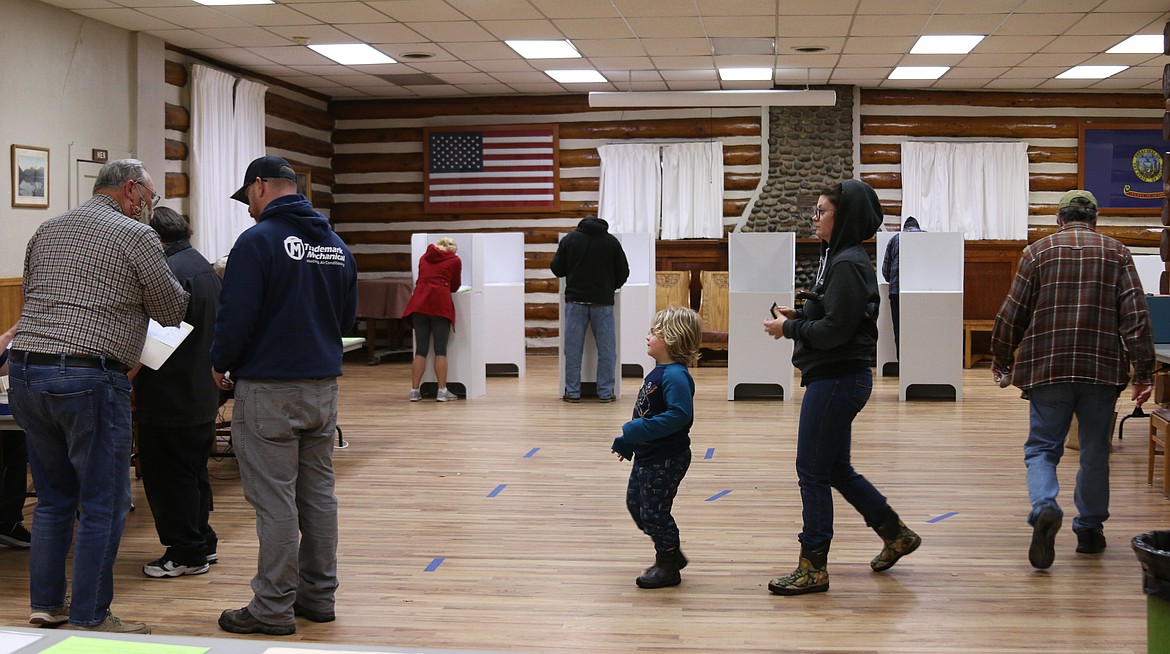 Residents line up to vote at the Sandpoint Community Hall to vote Tuesday night.