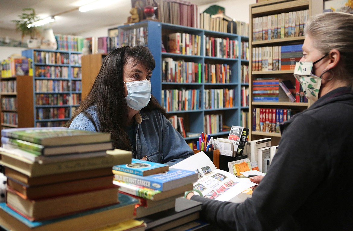 Susie Smith, of Columbia Falls, chats with Bad Rock Books owner Cindy Ritter on Wednesday, Nov. 4.
Mackenzie Reiss/Daily Inter Lake