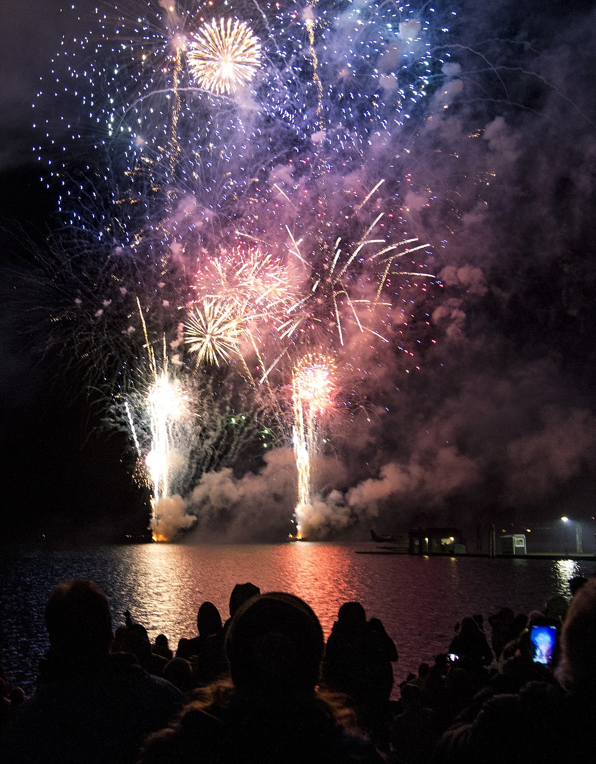 Fireworks explode over Lake Coeur d'Alene during The Coeur d'Alene Resort Lighting Ceremony Fireworks Show in 2017. This year's fireworks show has been canceled, but The Resort will turn on its holiday lights at 6 p.m. Nov. 27, the day after Thanksgiving.