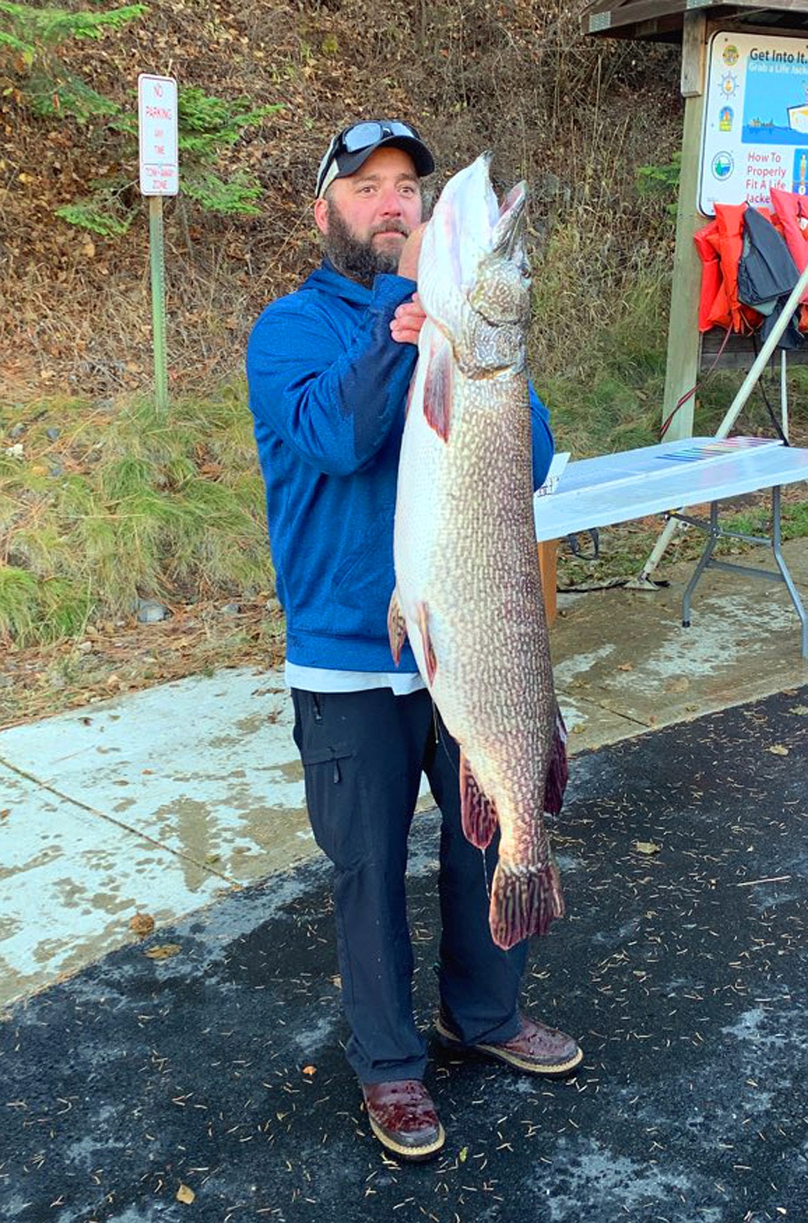 Photo by Phil Biggerstaff
Joshua Davis holds up the pike he pulled from Lake Coeur d'Alene on Sunday in the North Idaho Pike Association tournament.