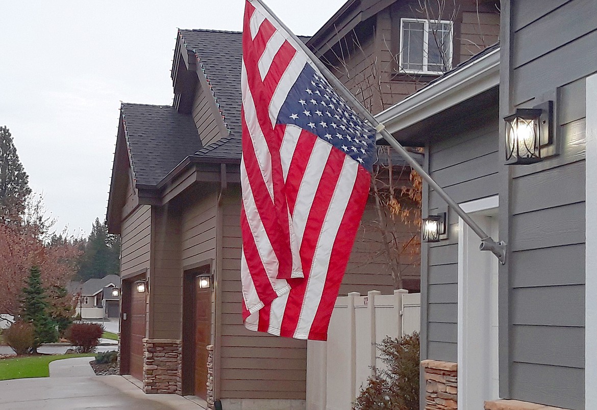 (CRAIG NORTHRUP/Press)
An American flag hangs upside down in Hayden in protest of the presidential election on Friday.