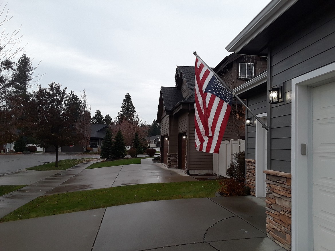 A flag hangs upside-down at a Hayden home. The owner turned his flag over in protest of the presidential election. Former Vice President Joe Biden holds a firm-but-still-in-question lead over President Donald Trump. (CRAIG NORTHRUP/Press)