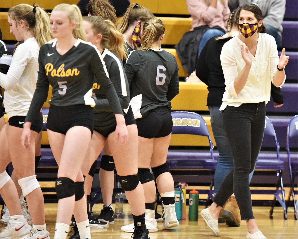 Polson head coach Lizzy Cox encourages her team during a timeout Friday night. (Scot Heisel/Lake County Leader)