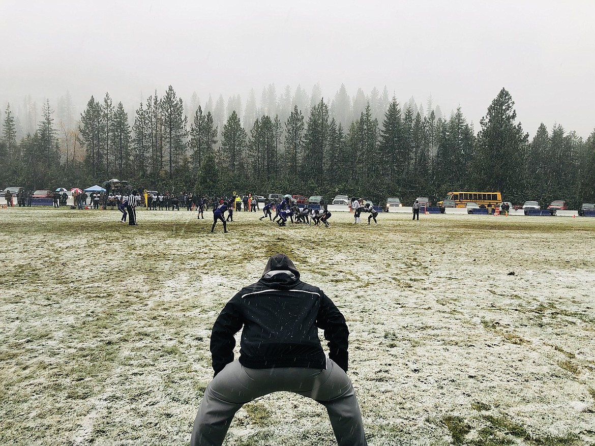 Mullan-St. Regis defensive coordinator Jesse Allan watches his defense intensely during the Tigers 28-12 win over Horseshoe Bend.