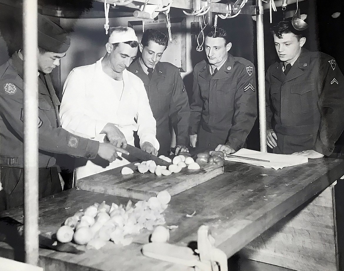 George Dong, far left, was given a citation for his efforts of running a mess hall with efficiency during World War II. He said it was a very difficult job because so many of the servicemen “were hillbillies and were drunk all the time.” This photo was used by the U.S. Army as a recruitment tool.