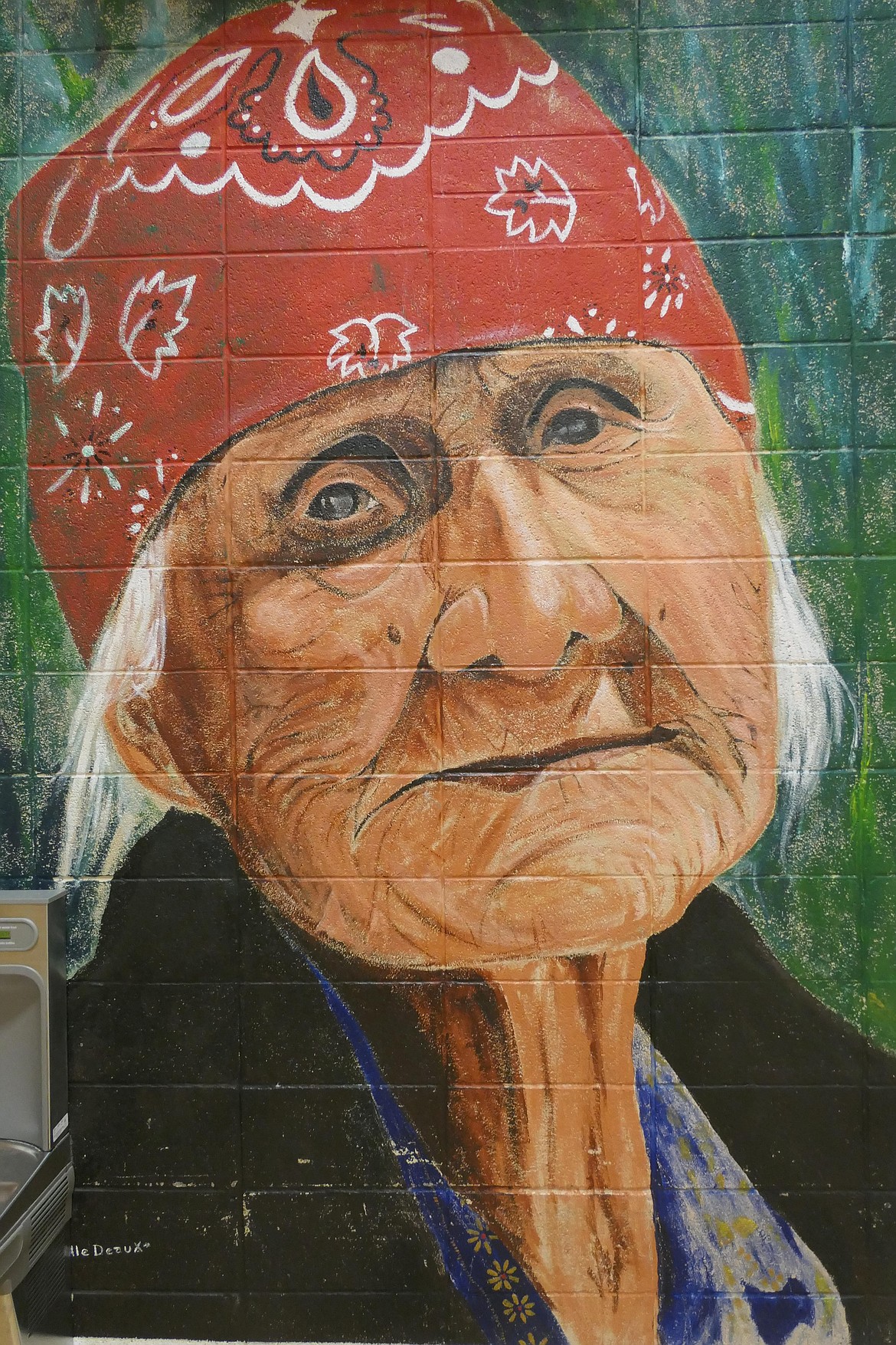 Agnes Woodcock Incashola, on of Dwight Billedeaux's giant portraits of historical figures that watch over games and community gatherings at the Tribal Fitness Center in St. Ignatius. (Carolyn Hidy/Lake County Leader)