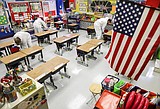 Virus surge: Schools abandon classes, states retreat