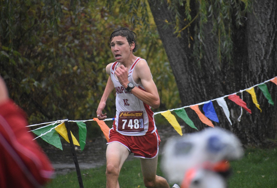Freshman Nathan Roche digs deep as he nears the finish of the 2020 William Johnson Sandpoint Invitational. Roche was named to the "Dirty Dozen" after a stellar first season.