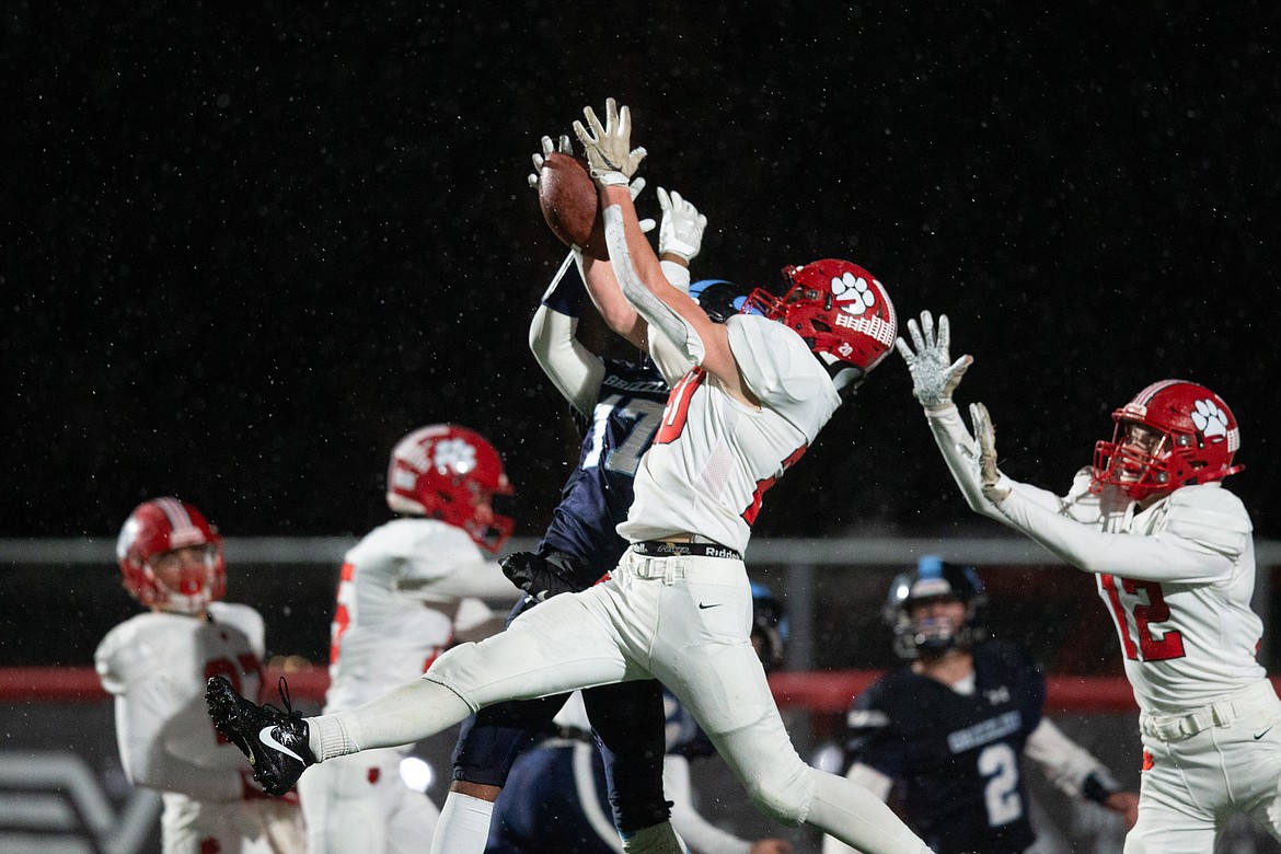 Sophomore Wes Benefield brings down an interception to end the first half of Friday's 4A state semifinal game.