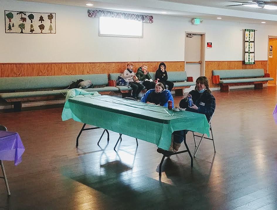 A group of St. Regis/Mullan, Idaho Tigers football fans attended a watch party at the community center for the live-streaming of the game against Dietrich. Fans were treated to free hot dogs and chips and more. (Submitted photo)