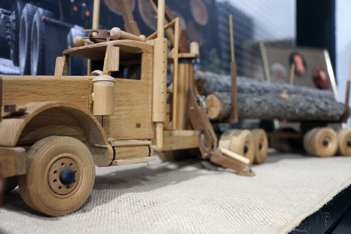 A close-up look at a model log truck created by Pat Mason, a longtime logger whose life was honored through a parade through the region where he lived and worked. In addition to being a master woodworker, Mason also was an artist whose work was treasured by family members.