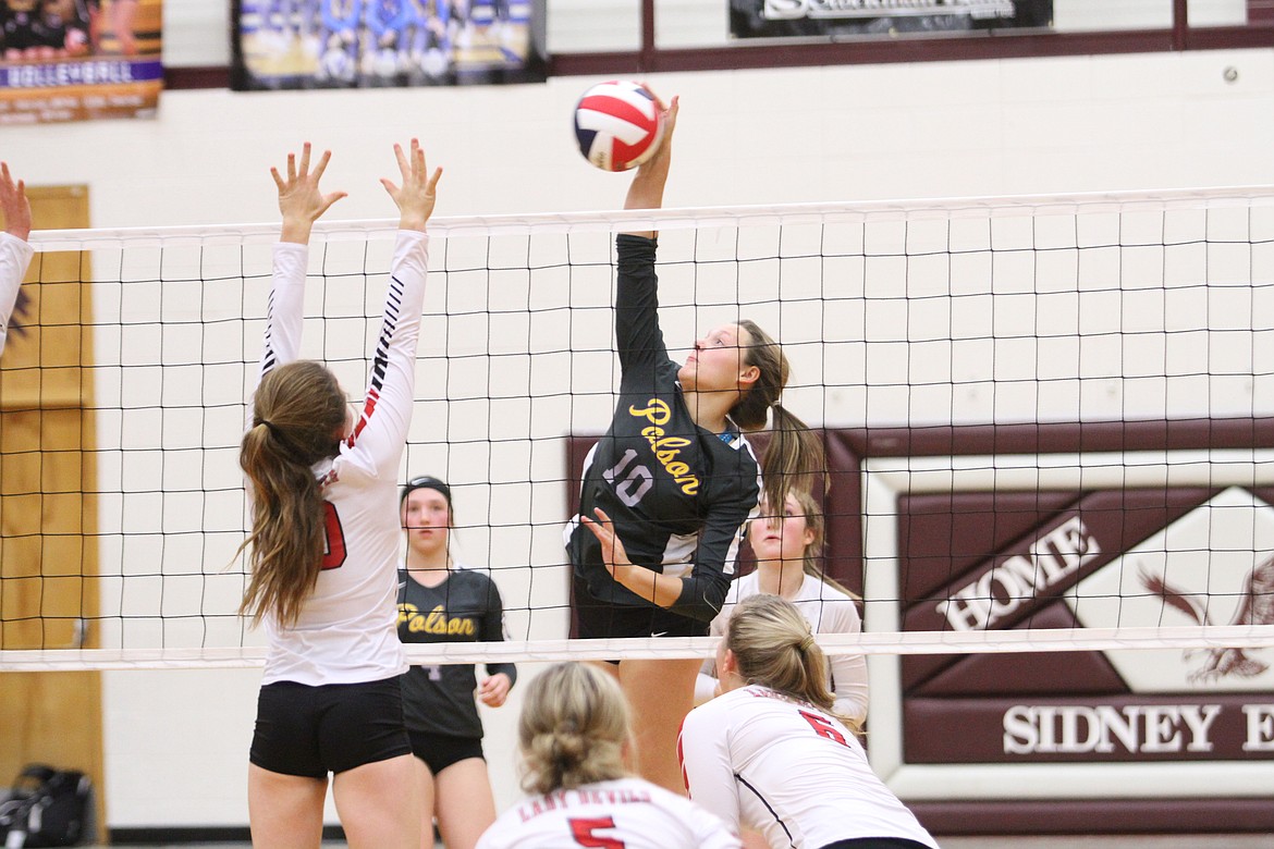 Polson's McKenna Hanson hits a shot against Glendive at the class A state tournament in Sidney. (Dillan Schorfheide/Sidney Herald)