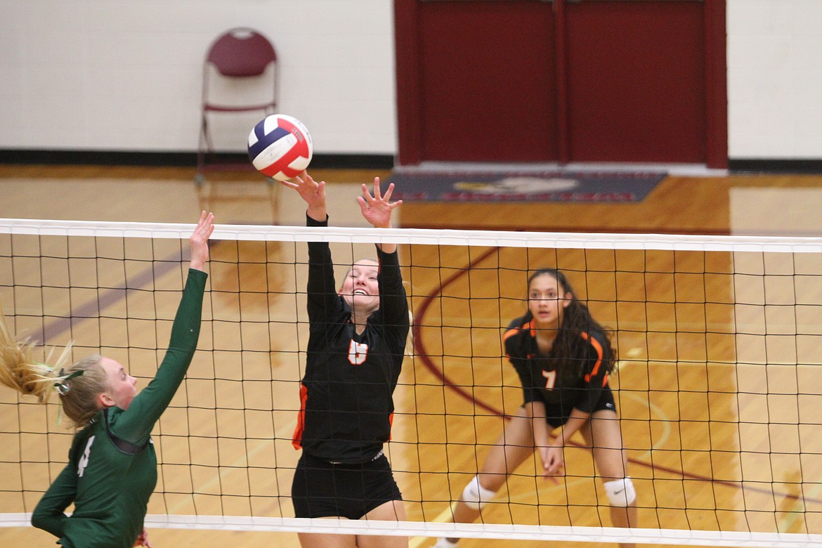 Ronan's Kiana King (8) defends a shot from Billings Central as teammate Leina Ulutoa (7) prepares to react. (Dillan Schorfheide/Sidney Herald)