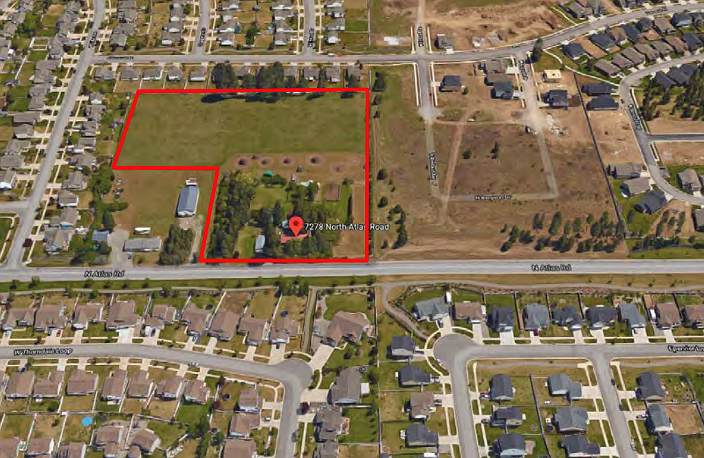 A bird's eye view looking east toward the newly-annexed property on Atlas Road. The property, which is now R-8 and could fit 62 homes, is penciled in for 41 single family dwellings.