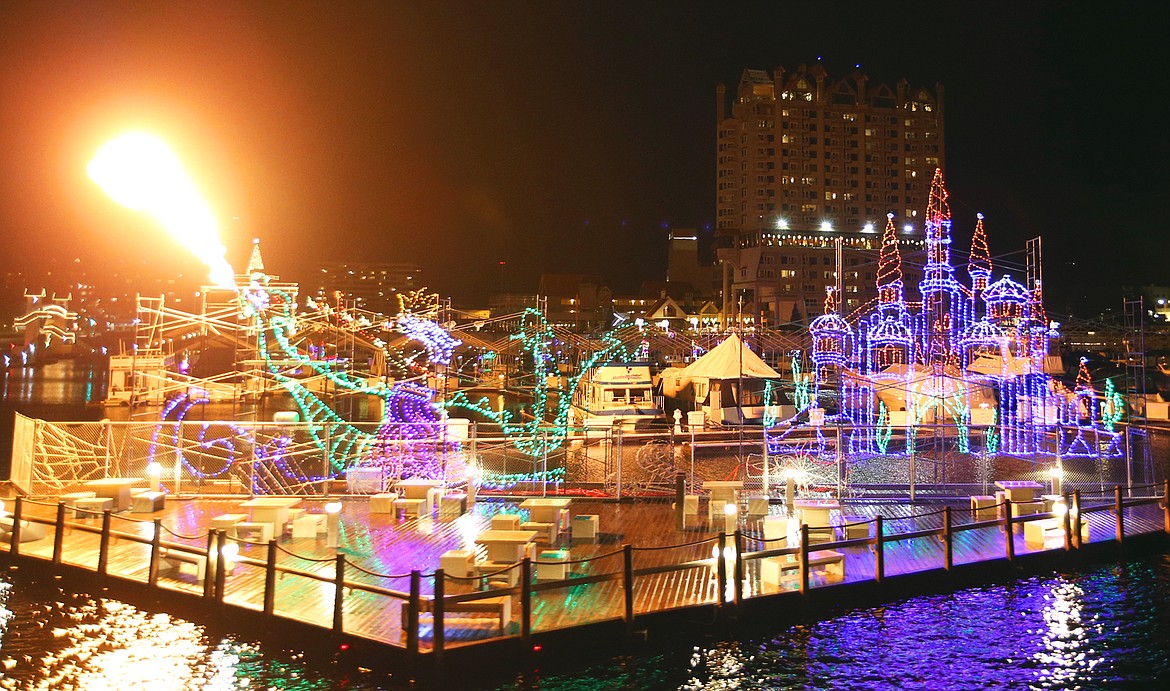 Holiday lights glow at The Coeur d'Alene Resort Boardwalk Tuesday night.