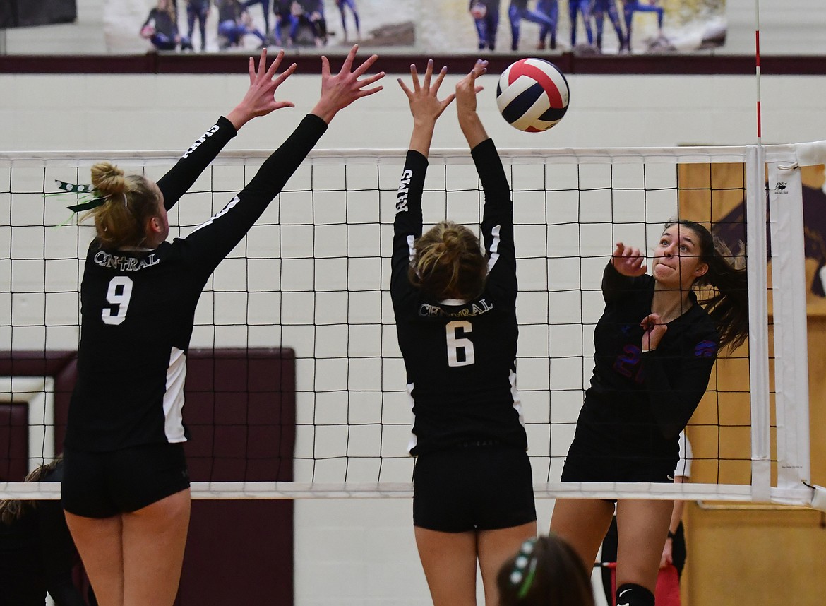 Mady Hoerner with a trademark kill against Central during the championship. (Teresa Byrd/ Hungry Horse News)