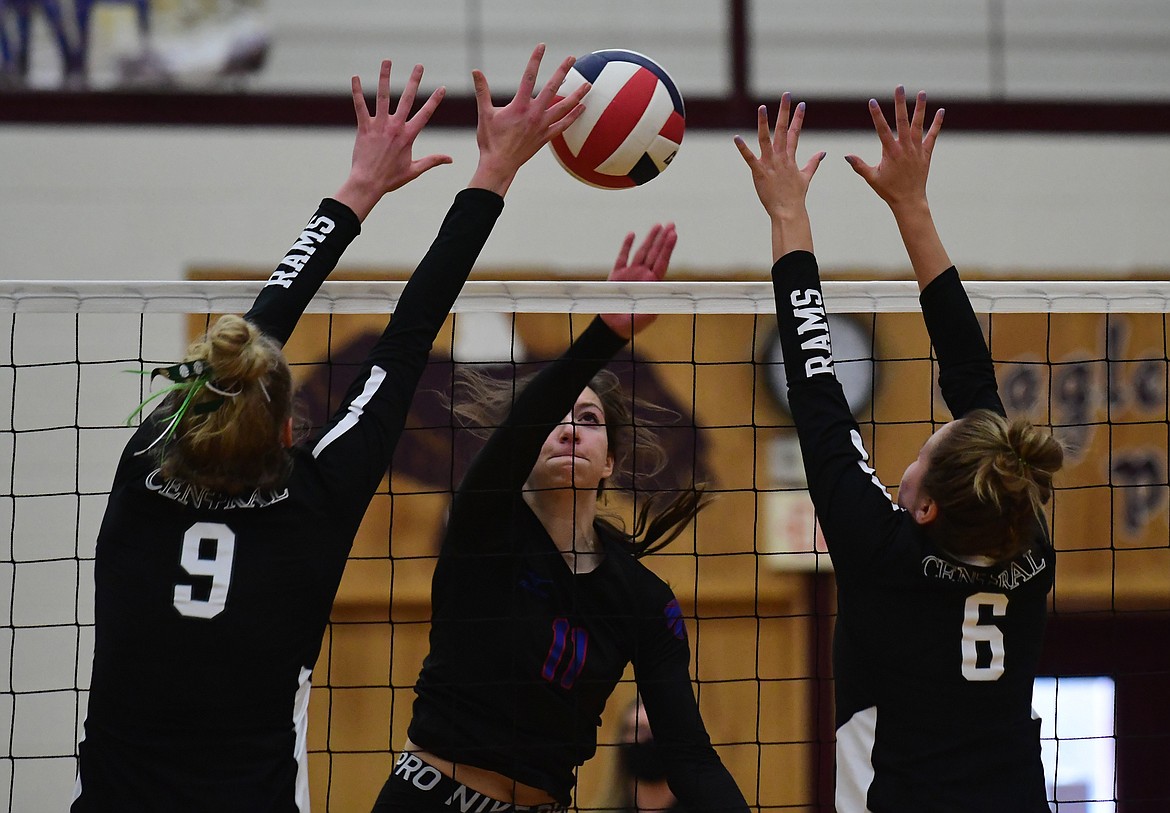 Jazzy Marino taps the ball over the net against Billings Central during the championship match on Saturday. (Teresa Byrd/Hungry Horse News)