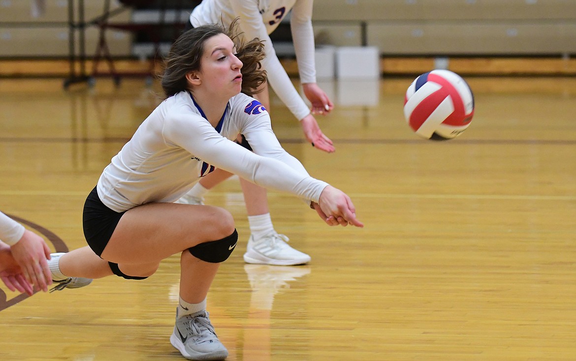 Jazzy Marino lunges for the dig in a match against Corvallis at the state tournament last Friday. (Teresa Byrd/Hungry Horse News)