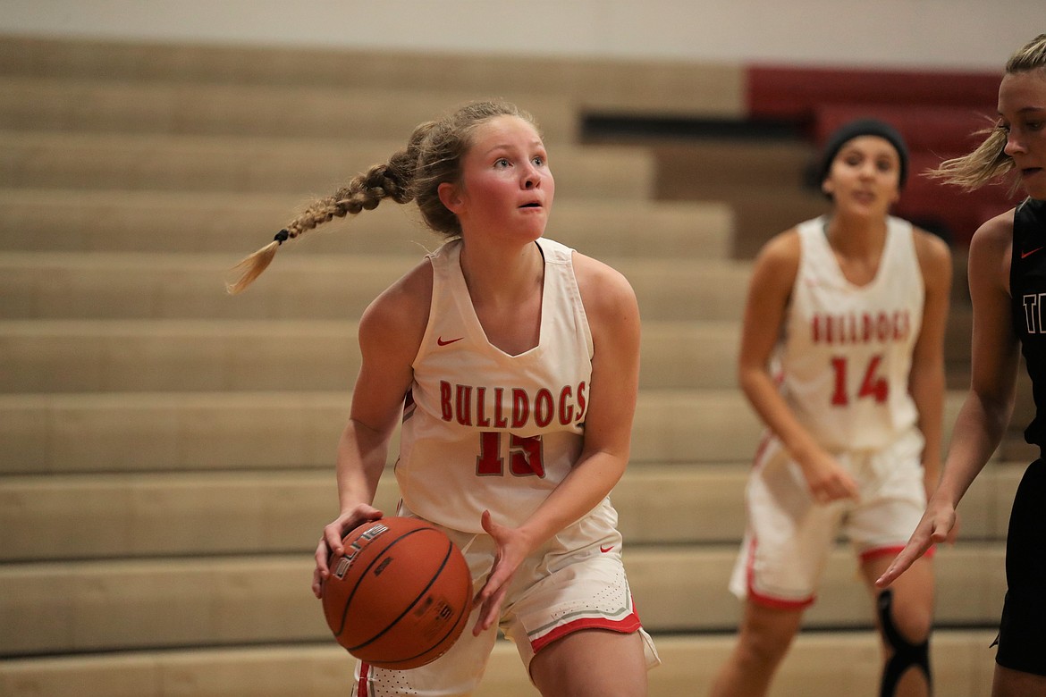 Sophomore Karlie Banks drives baseline during the second half of Tuesday's game.