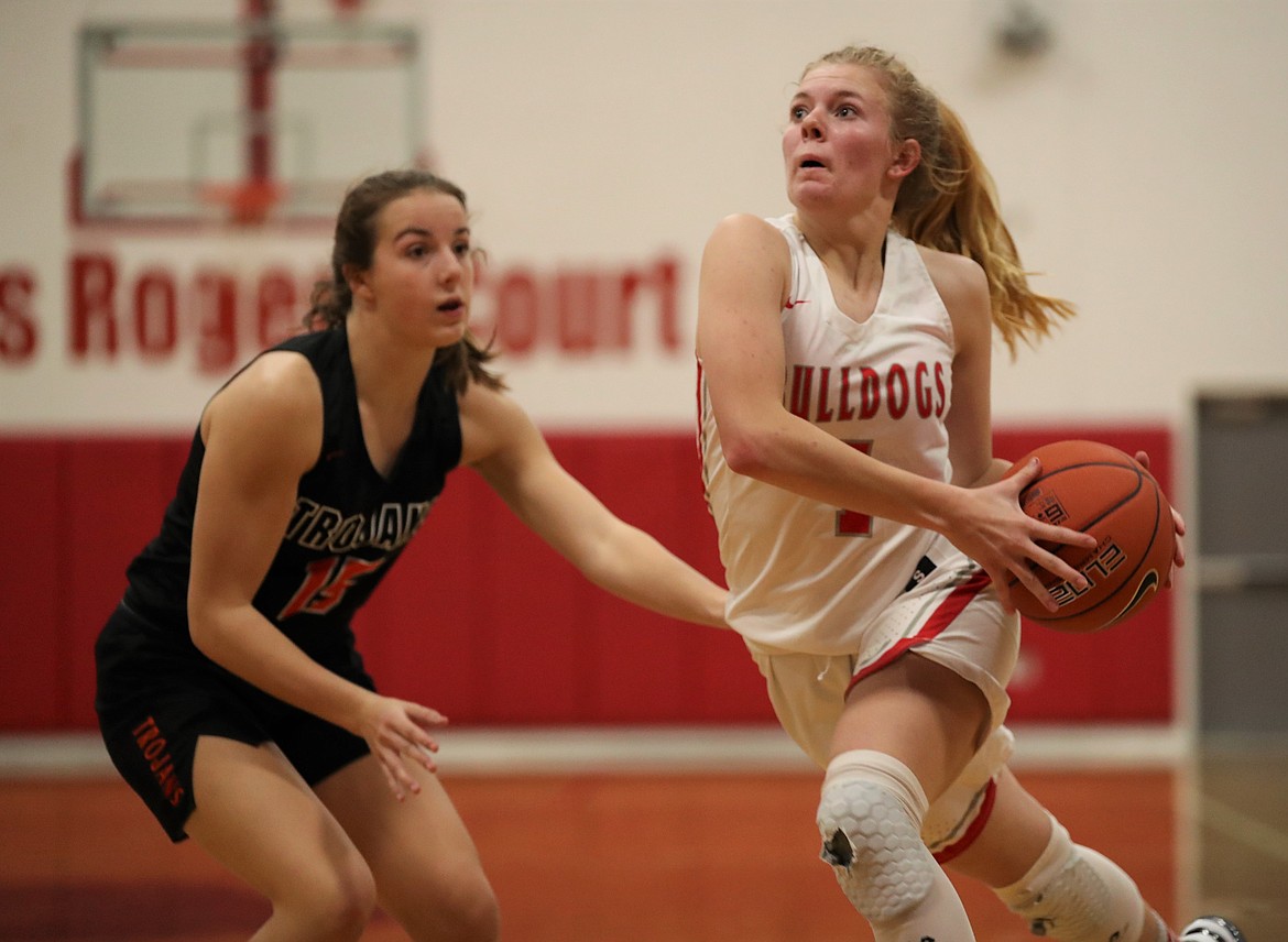 Sophomore Kelsey Cessna drives to the basket during Tuesday's game at Les Rogers Court.
